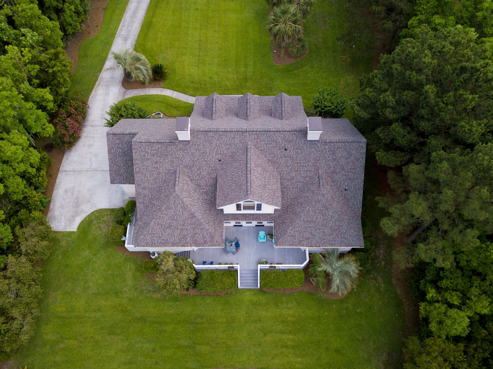 Aerial view of a home with a new shingle roof